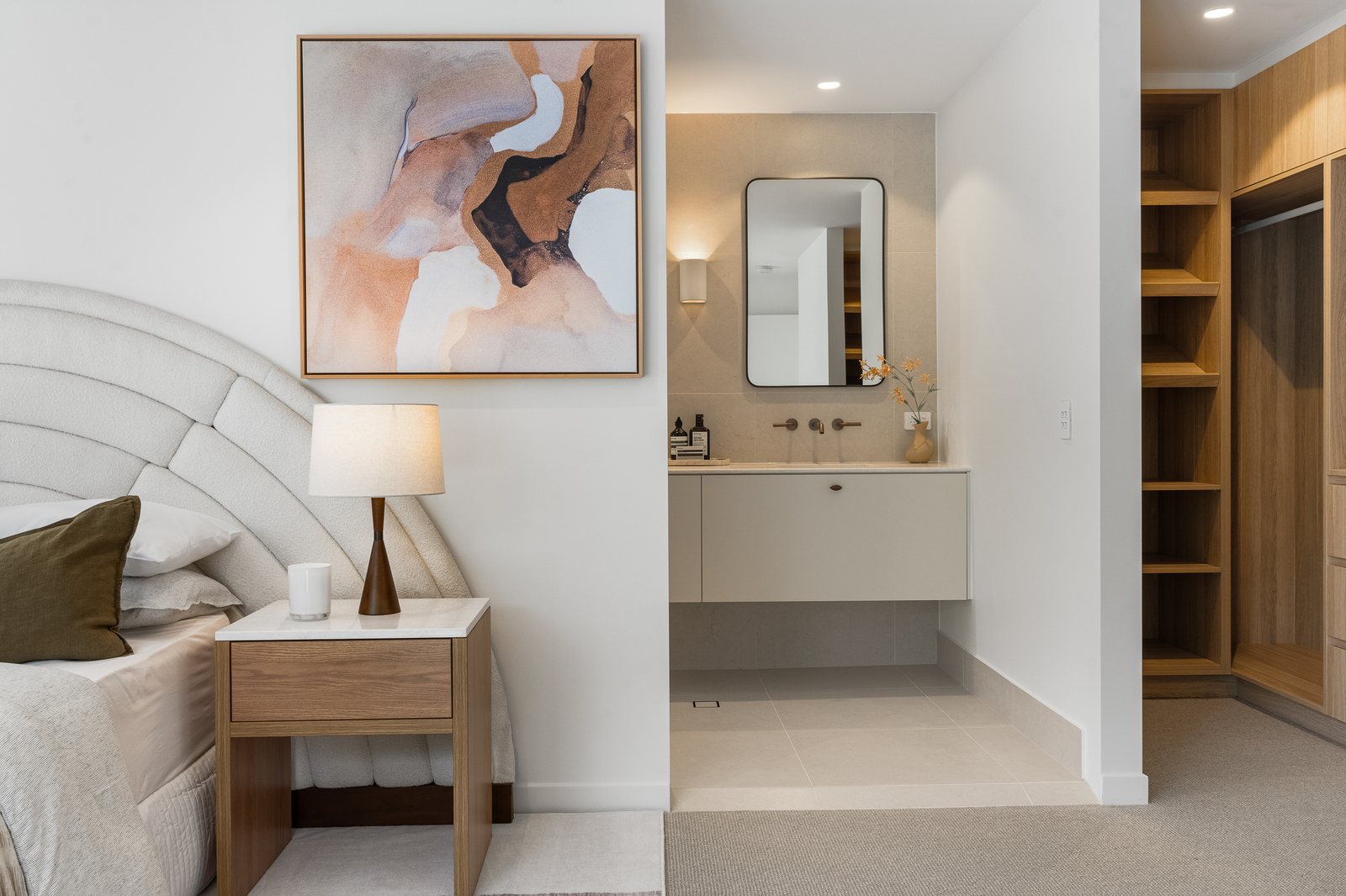 Bedroom with ensuite vanity and built-in robe in a Gold Coast renovation
